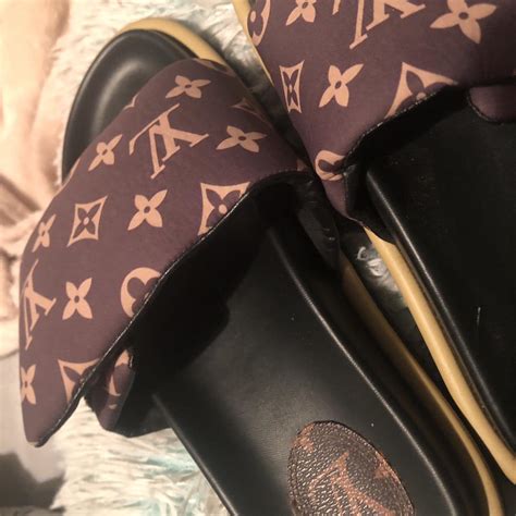 louis vuitton pillow slides.